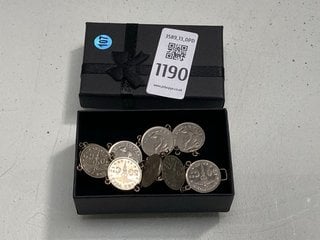 Lot 1190  
            Marchington SR13 - Parcel Delivery Only 

                
AN ANTIQUE COIN CHARM BRACELET MADE FROM 1920S BELGIAN 50 CENTIMES COINS, BOXED: ...