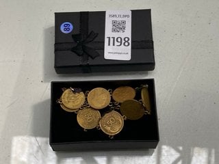Lot 1198  
            Marchington SR13 - Parcel Delivery Only 

                
AN ANTIQUE FRENCH COIN CHARM BRACELET MADE FROM DEPT. OF COMMERCE 50 CENTIME COIN...