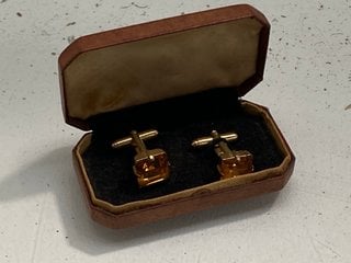 Lot 1212  
            Marchington SR13 - Parcel Delivery Only 

                
A PAIR OF GOLD COLOURED ANTIQUE CUFFLINKS SET WITH SILVER STONES, BOXED: LOCATION...