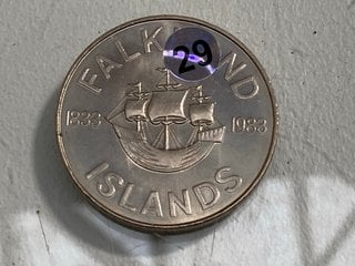 Lot 1226  
            Marchington SR13 - Parcel Delivery Only 

                
FALKLAND ISLANDS 150TH COMMEMORATIVE FIFTY PENCE COIN, 1983: LOCATION - F1