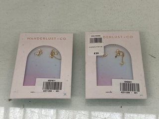 Lot 1280  
            Marchington SR13 - Parcel Delivery Only 

                
2 X WANDERLUST + CO WISH UPON THE STARS DROP EARRINGS - COMBINED ORIGINAL RRP £11...