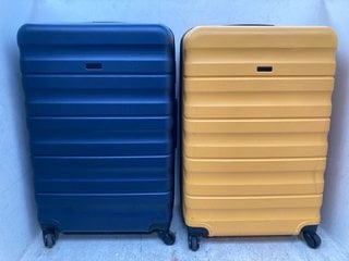 Lot 1295  
            Marchington SR13 - Parcel Delivery Only 

                
2 X JOHN LEWIS & PARTNERS 4 WHEELED HARD SHELL LARGE SUITCASES IN NAVY & YELLOW: ...