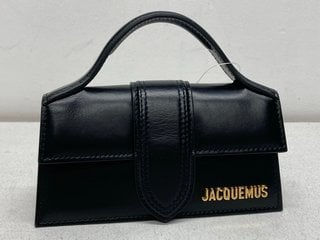 Lot 21  
            Marchington SR13 - Parcel Delivery Only 

                
JACQUEMUS LEATHER HAND BAG IN BLACK-ORIGINAL RRP £595.00: LOCATION - BOOTH