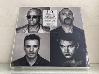 Lot 514  
            Marchington SR13 - Parcel Delivery Only 

                
U2 4 LP LIMITED EDITION NUMBERED COLLECTION SONGS OF SURRENDER BOX SET-ORIGINAL R...