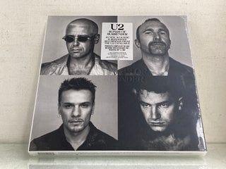Lot 515  
            Marchington SR13 - Parcel Delivery Only 

                
U2 4 LP LIMITED EDITION NUMBERED COLLECTION SONGS OF SURRENDER BOX SET-ORIGINAL R...