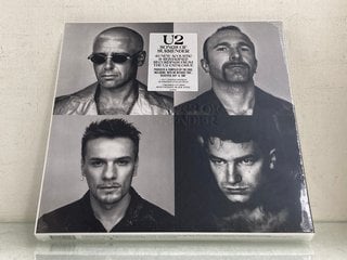 Lot 517  
            Marchington SR13 - Parcel Delivery Only 

                
U2 4 LP LIMITED EDITION NUMBERED COLLECTION SONGS OF SURRENDER BOX SET-ORIGINAL R...