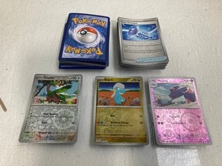 Lot 529  
            Marchington SR13 - Parcel Delivery Only 

                
50 X VINTAGE HOLOGRAPHIC AND REVERSE HOLO POKEMON CARDS (NO ENERGY CARDS): LOCATI...