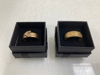 Lot 535  
            Marchington SR13 - Parcel Delivery Only 

                
EASTERN STYLE ENGRAVED GOLD COLOURED RING TO INCLUDE GOLD COLOURED RING SET WITH ...