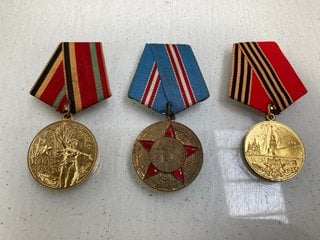 Lot 542  
            Marchington SR13 - Parcel Delivery Only 

                
3 X ASSORTED RUSSIAN SOVIET MEDALS TO INCLUDE 1968 "50 YEARS OF THE ARMED FORCES ...