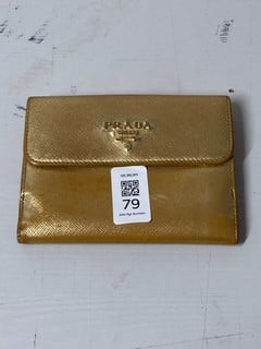 Lot 79  
            Nottingham SR3 - Delivery Only 

                
PRADA GOLDEN SAFFIANO WALLET