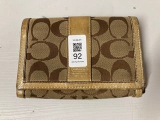 Lot 92  
            Nottingham SR3 - Delivery Only 

                
COACH HAMPTON SIGNATURE BROWN WALLET