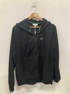 Lot 1027  
            Nottingham SR9 - Delivery Only 

                
LACOSTE BLACK LOGO ZIP-UP HOODIE UK SIZE 6