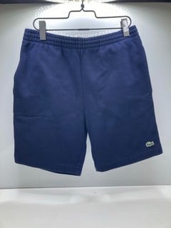 Lot 581  
            Nottingham SR9 - Delivery Only 

                
LACOSTE BLUE MENS SHORTS UK SIZE M
