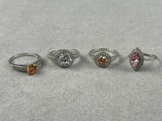 Lot 168  
            Nottingham Luxury Room - Delivery Only 

                
Silver Selection of Four Pink, Champagne and Clear Stone Rings, Sizes M, M½, N an...