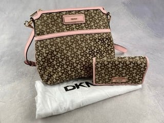 Lot 92  
            Nottingham Luxury Room - Delivery Only 

                
DKNY Bag And Purse, With Dust Bag, Approx. 23x23x5cm (VAT ONLY PAYABLE ON BUYERS ...