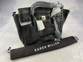 Lot 97  
            Nottingham Luxury Room - Delivery Only 

                
Karen Millen Bag, With Tags & Dust Bag Approx. 36x32x13cm (VAT ONLY PAYABLE ON BU...