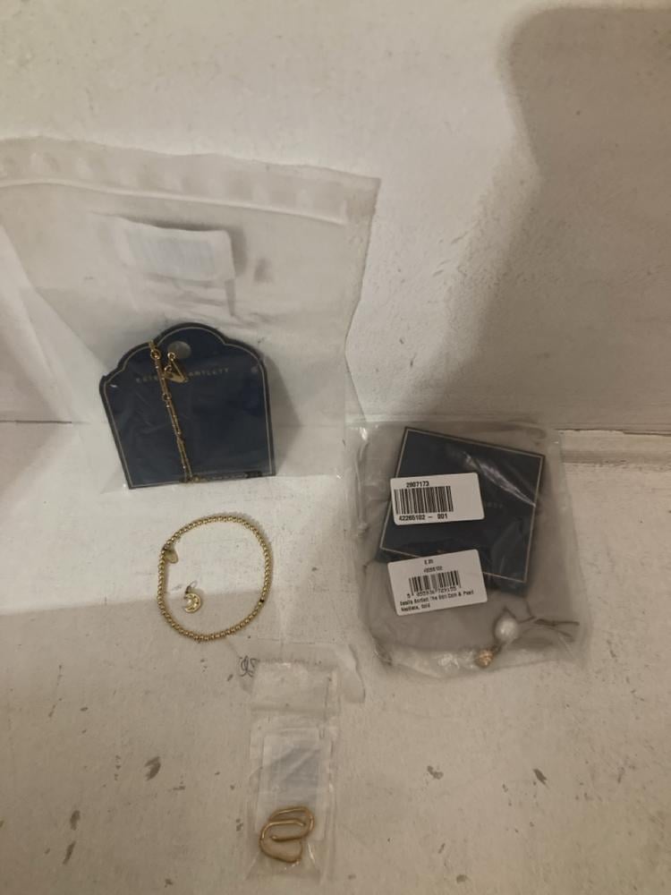 Lot 71  
            Birmingham SR108 - Parcel Delivery Only 
                
3 X ITEMS TO INCLUDE JOHN LEWIS & PARTNERS ESTELLA BARTLETT 18TC GOLD PLATED NECK...