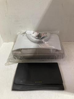 Lot 754  
            Birmingham SR108 - Parcel Delivery Only 
                
2 X JOHN LEWIS & PARTNERS ITEMS TO INCLUDE STACKERS THE LAPTOP BAG