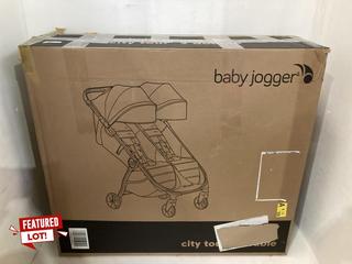 Lot 78  
            Birmingham SR108 - Parcel Delivery Only 
                
BABY JOGGER CITY TOUR 2 DOUBLE PUSHCHAIR ORIGINAL RRP £509