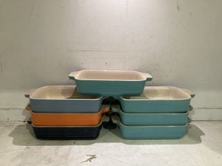 Lot 149  
            Birmingham - Collection Only 

                
DAVID PHILLIPS SET OF LE CREUSET CERAMIC PIE DISHES IN VARIOUS COLOURS