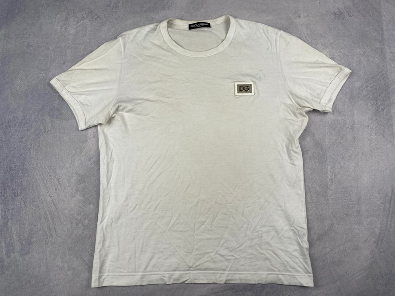 Lot 148  
            Nottingham Luxury Room - Delivery Only 

                
Dolce & Gabanna T-Shirt (Stained) - Size 50 (VAT ONLY PAYABLE ON BUYERS PREMIUM)