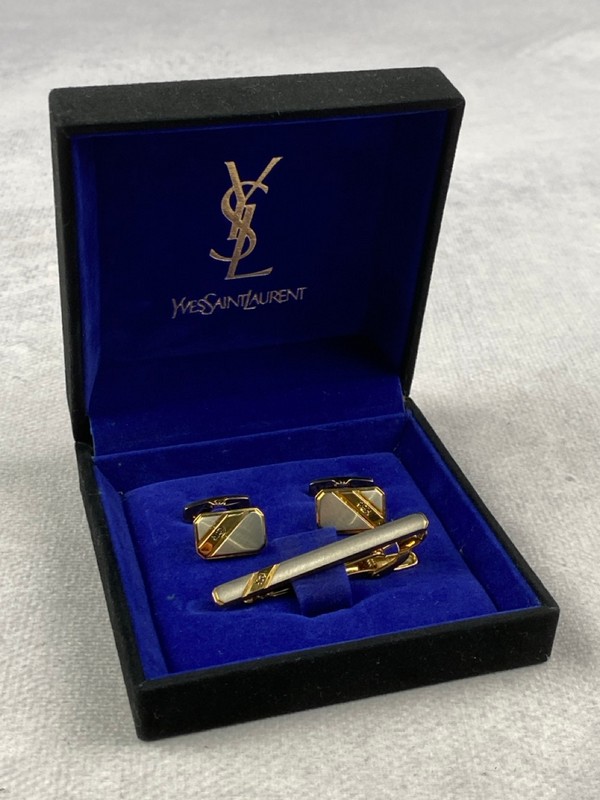 Lot 212  
            Nottingham Luxury Room - Delivery Only 

                
Yves Saint Laurent Tow-Tone Cufflinks And Tie Clip Set With Box - (VAT ONLY PAYAB...