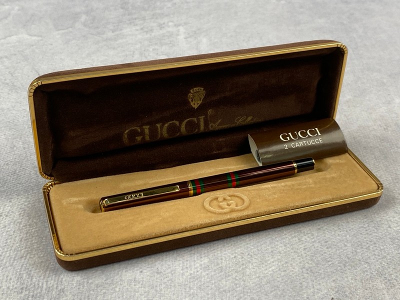 Lot 224  
            Nottingham Luxury Room - Delivery Only 

                
Gucci Fountain Pen With Box - (VAT ONLY PAYABLE ON BUYERS PREMIUM)