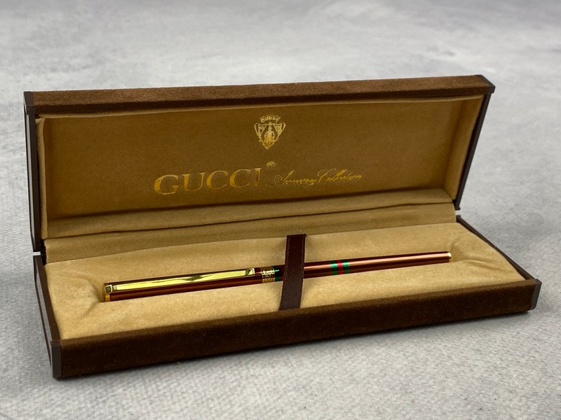 Lot 225  
            Nottingham Luxury Room - Delivery Only 

                
Gucci Ballpoint Pen With Box - (VAT ONLY PAYABLE ON BUYERS PREMIUM)