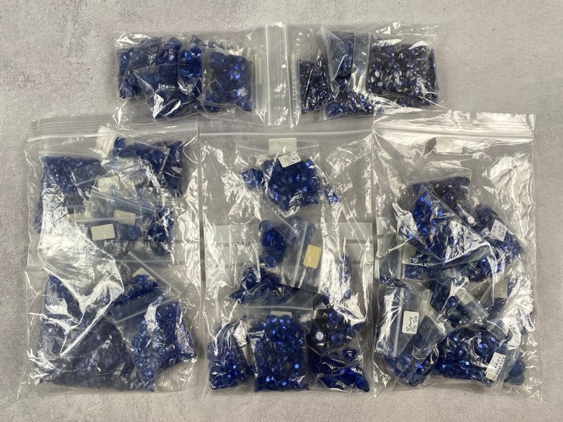 Lot 236  
            Nottingham Luxury Room - Delivery Only 

                
Five Bags of Blue Stones, mixed Shapes and Sizes, approx 1.70 Kg (VAT ONLY PAYABL...