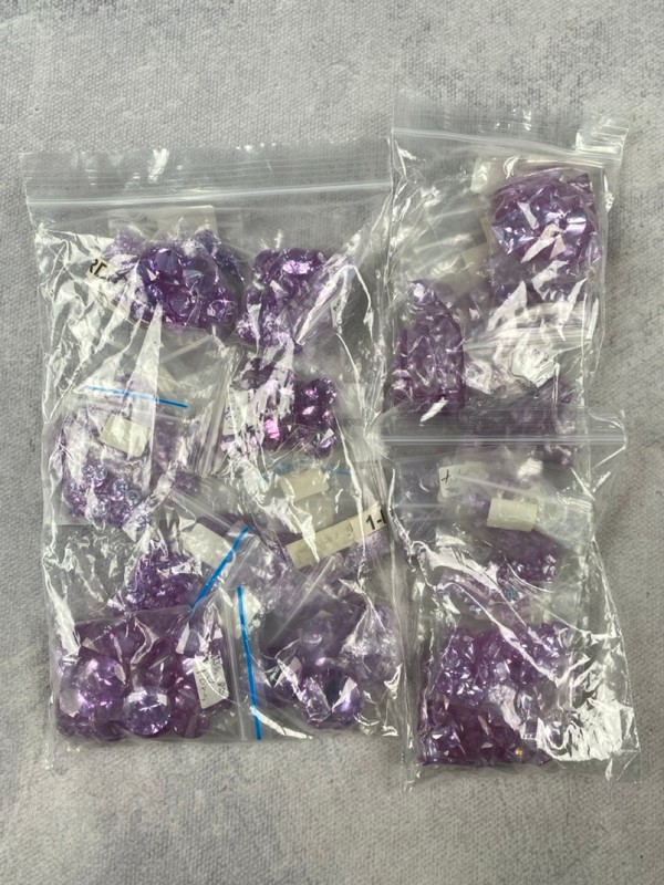 Lot 238  
            Nottingham Luxury Room - Delivery Only 

                
Three Bags of Lilac Stones, mixed Shapes and Sizes, approx. 1.10Kg (VAT ONLY PAYA...