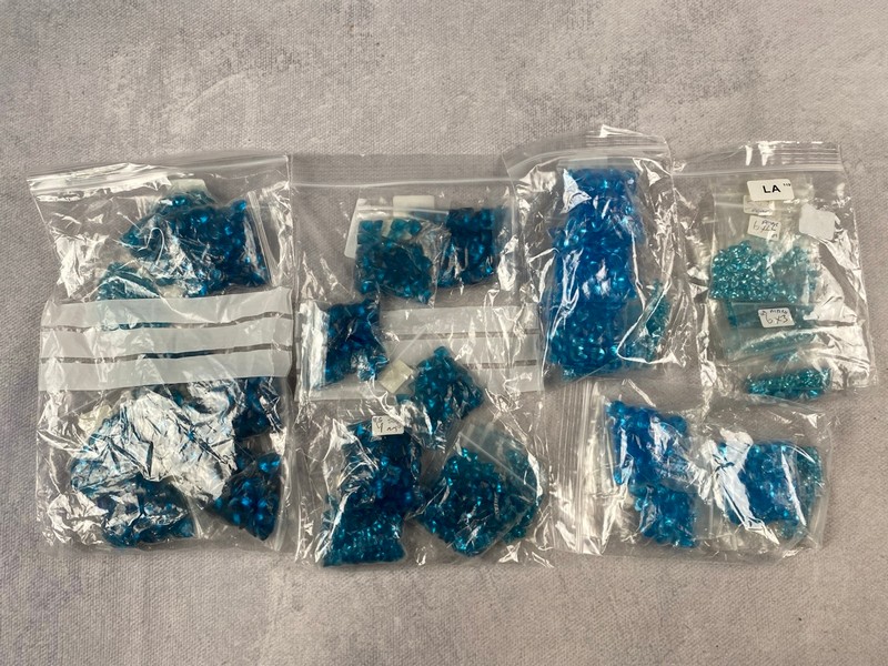 Lot 240  
            Nottingham Luxury Room - Delivery Only 

                
Five Bags of Blue Stones, mixed Shapes and Sizes, approx. 0.80Kg (VAT ONLY PAYABL...