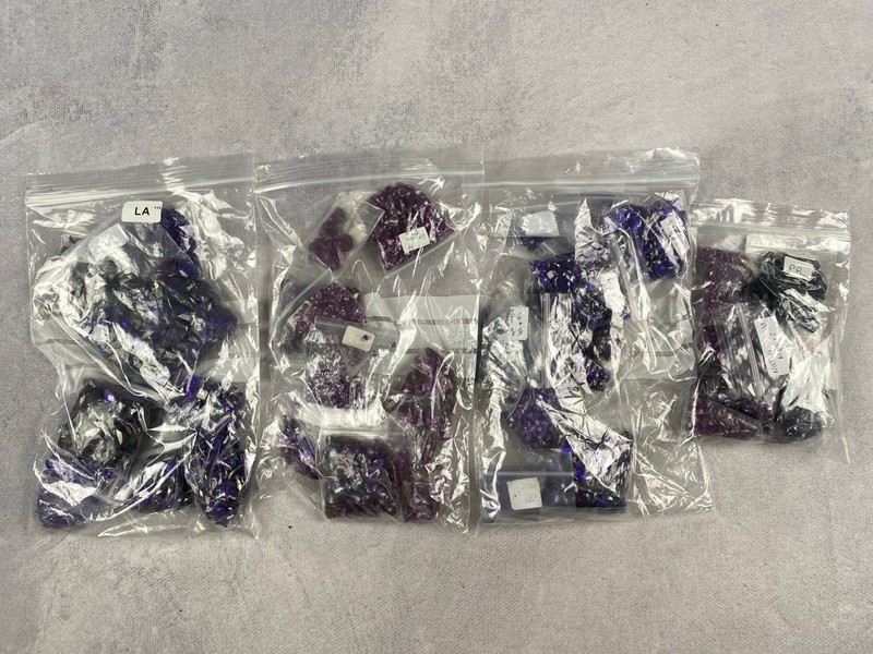 Lot 245  
            Nottingham Luxury Room - Delivery Only 

                
Five Bags of Purple Stones, mixed Shapes and Sizes, approx. 1.88Kg (VAT ONLY PAYA...