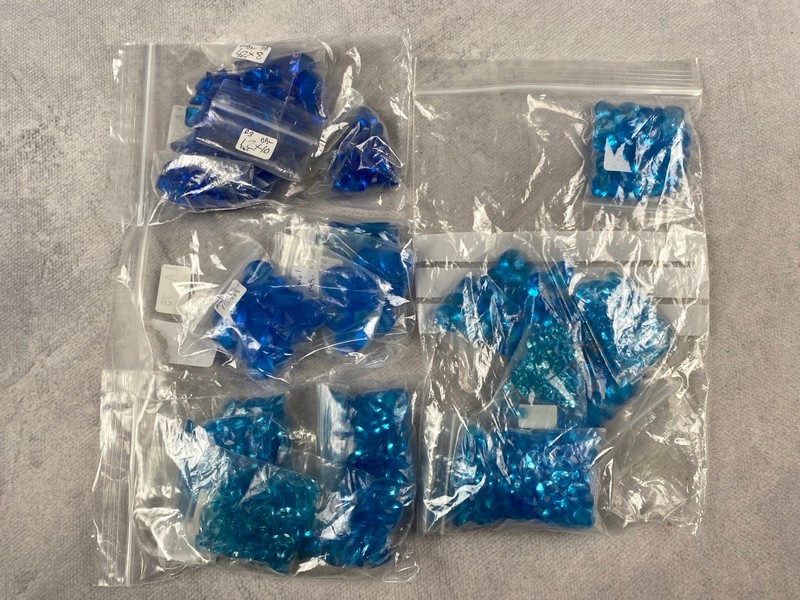 Lot 246  
            Nottingham Luxury Room - Delivery Only 

                
Four Bags of Blue Stones, mixed Shapes and Sizes, approx. 0.58Kg (VAT ONLY PAYABL...