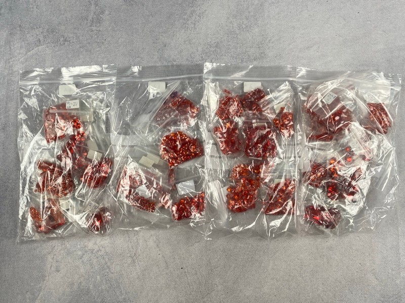 Lot 247  
            Nottingham Luxury Room - Delivery Only 

                
Four Bags of Orange Stones, mixed Shapes and Sizes, approx. 1.30Kg (VAT ONLY PAYA...