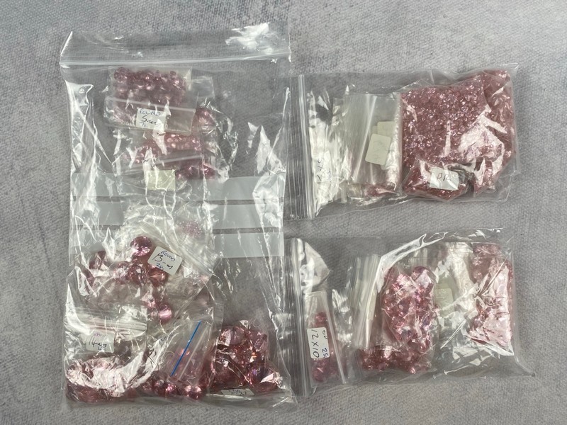 Lot 248  
            Nottingham Luxury Room - Delivery Only 

                
Three Bags of Pink Stones, mixed Shapes and Sizes, approx. 0.74Kg (VAT ONLY PAYAB...