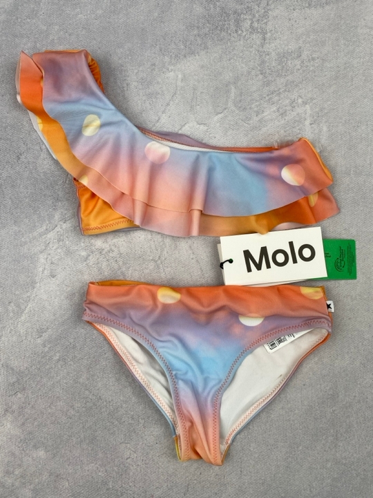 Lot 281  
            Nottingham Luxury Room - Delivery Only 

                
Molo Girls Sun Print Nikkie Asymmetrical Bikini In Orange. Size: 104. Rrp: £55 (V...
