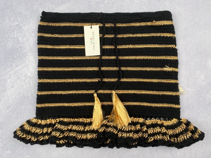 Lot 288  
            Nottingham Luxury Room - Delivery Only 

                
Nessi Byrd Black and Gold Knitted Skirt, 14 Years