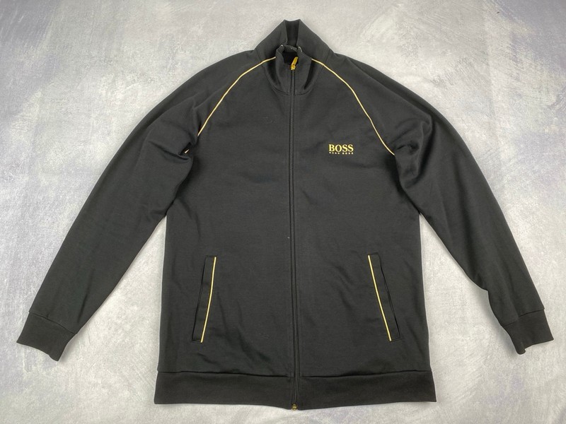 Lot 37  
            Nottingham Luxury Room - Delivery Only 

                
Hugo Boss Track Top - Size L (VAT ONLY PAYABLE ON BUYERS PREMIUM)