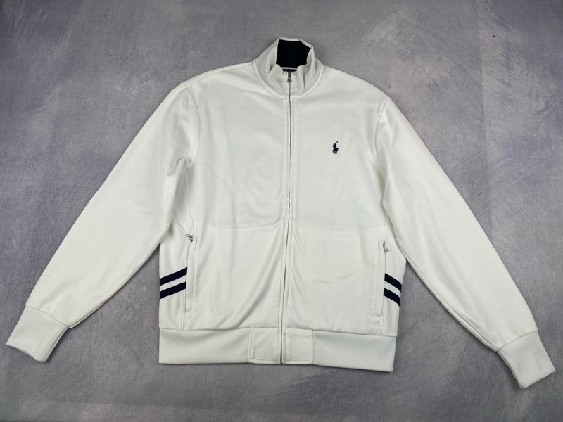 Lot 97  
            Nottingham Luxury Room - Delivery Only 

                
Polo By Ralph Lauren Zip Sweater - Size M (VAT ONLY PAYABLE ON BUYERS PREMIUM)