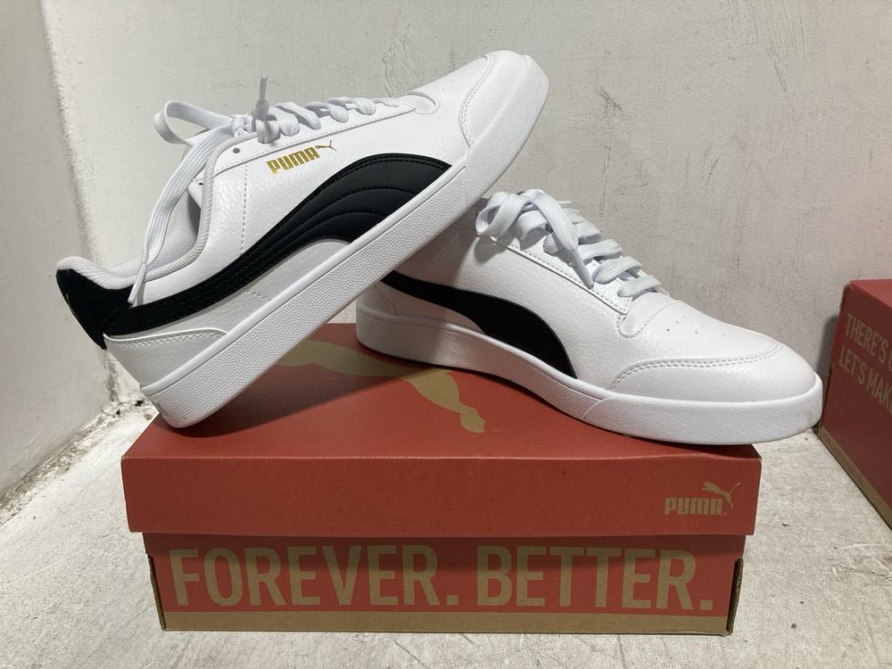 Lot 428  
            Chesterfield SR46 - Parcel Delivery Only 

                
PUMA LEATHER SNEAKERS IN BLACK & WHITE - UK SIZE 8.5 TO INCLUDE PUMA RUNNING TRAI...