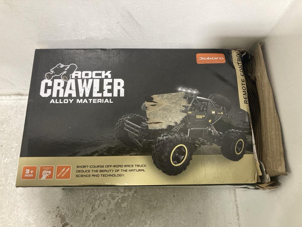 Lot 557  
            Chesterfield SR46 - Parcel Delivery Only 

                
ROCK CRAWLER ALLOW MATERIAL RC CAR (LOCATION: I5) - Image 4