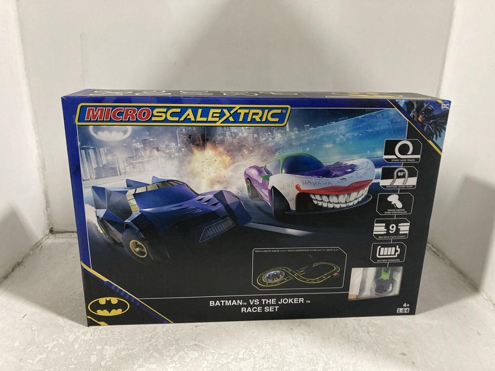 Lot 605  
            Chesterfield SR46 - Parcel Delivery Only 

                
DC BATMAN ULTIMATE TRANSFORMER BATMOBILE TO INCLUDE MICRO SCALEXTRIC BATMAN VS TH... - Image 2