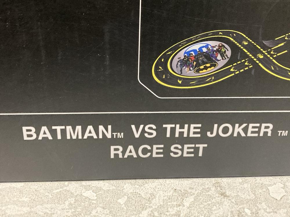 Lot 605  
            Chesterfield SR46 - Parcel Delivery Only 

                
DC BATMAN ULTIMATE TRANSFORMER BATMOBILE TO INCLUDE MICRO SCALEXTRIC BATMAN VS TH... - Image 4