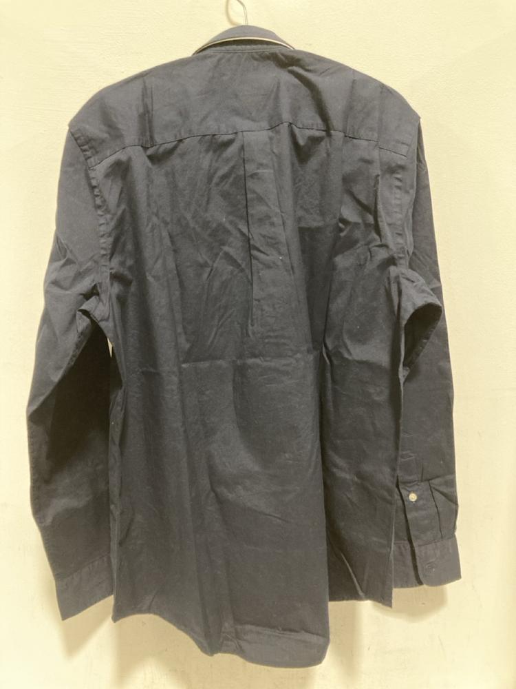 Lot 663  
            Chesterfield SR46 - Parcel Delivery Only 

                
TOMMY HILFIGER COE FLEX SHIRT IN NAVY - UK SIZE M TO INCLUDE TOMMY HILFIGER STRET... - Image 3