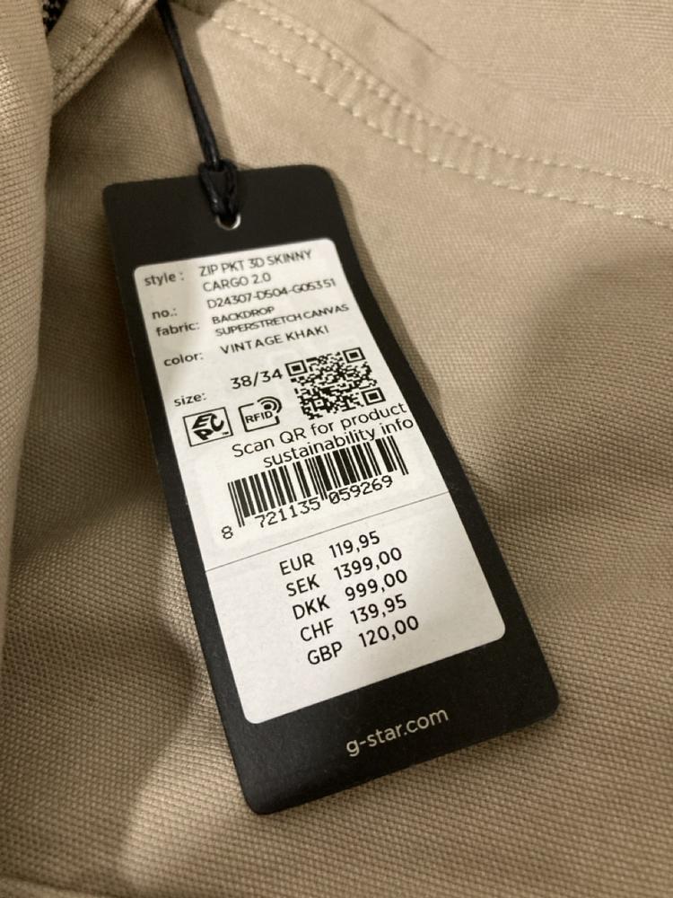 Lot 703  
            Chesterfield SR46 - Parcel Delivery Only 

                
G-STAR RAW CARGO BOTTOMS IN LIGHT BROWN - UK SIZE 38 X 34 G-STAR RAW SHIRT IN NAV... - Image 3