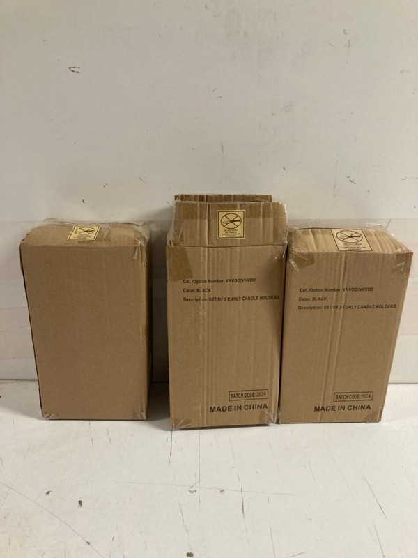 Lot 395  
            Nottingham SR3 - Delivery Only 

                
3 X SHOP DIRECT IRELAND SET OF 2 CURLY CANDLE HOLDERS