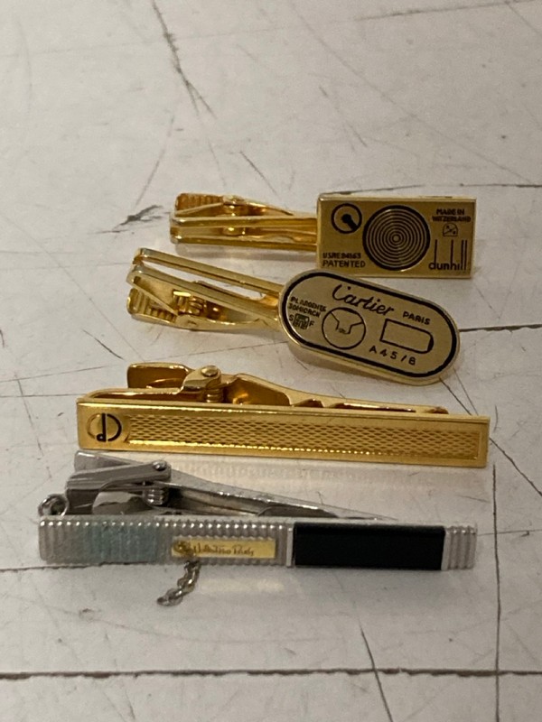 Lot 5  
            Nottingham SR3 - Delivery Only 

                
VARIOUS TIE CLIPS TO INCLUDE CARTIER
