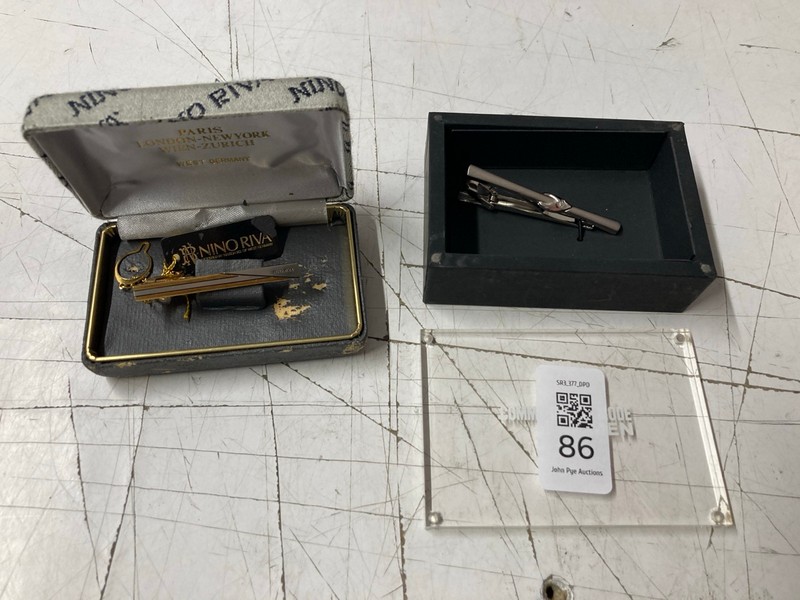 Lot 86  
            Nottingham SR3 - Delivery Only 

                
NINO RIVA GOLD METAL TIE CLIP