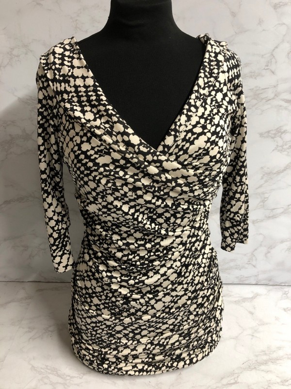 Lot 120  
            Nottingham SR5 - Delivery Only 

                
DIANE VON FURSTENBERG PRINTED WRAP DRESS IN BLACK SILK SIZE:US/8 RRP:£445