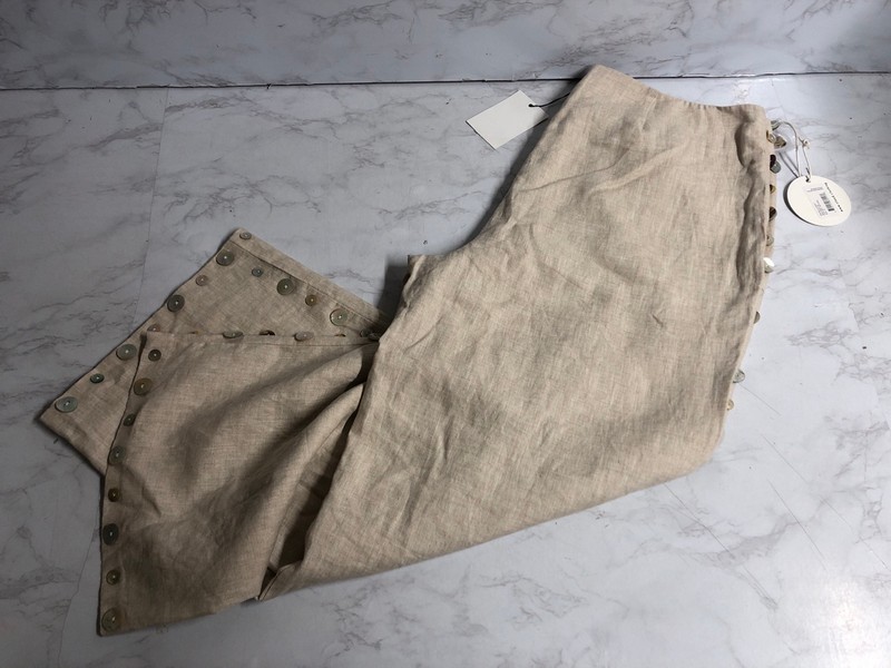 Lot 171  
            Nottingham SR5 - Delivery Only 

                
STAUD RAVELLA PANTS WITH BUTTON DETAILS IN BEIGE LINEN SIZE:US/14 RRP:£207